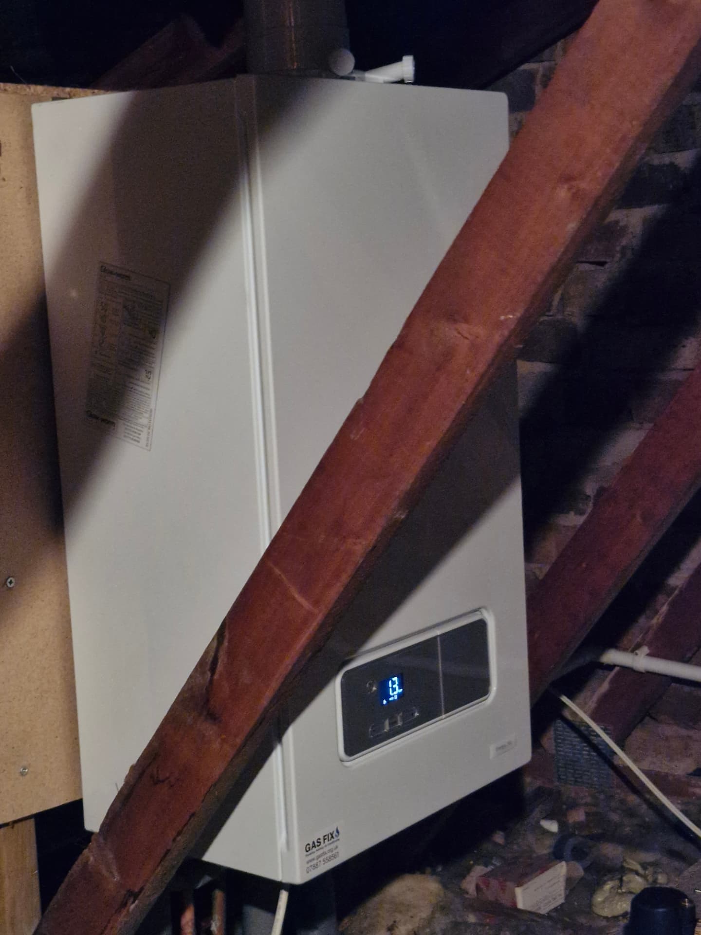 New Gas Fix branded boiler installed in a loft space